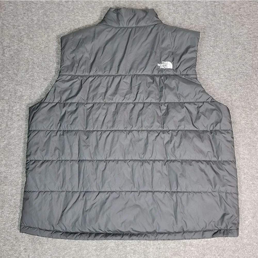 Premium insulated puffer vest by The North Face featuring embroidered Synchrony
